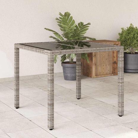 vidaXL Puutarhapöytä lasilevyllä harmaa 90x90x75 cm polyrottinki