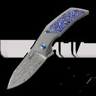 Reate T2500 Damasteel kääntöveitsi, Titanium & Mokuti