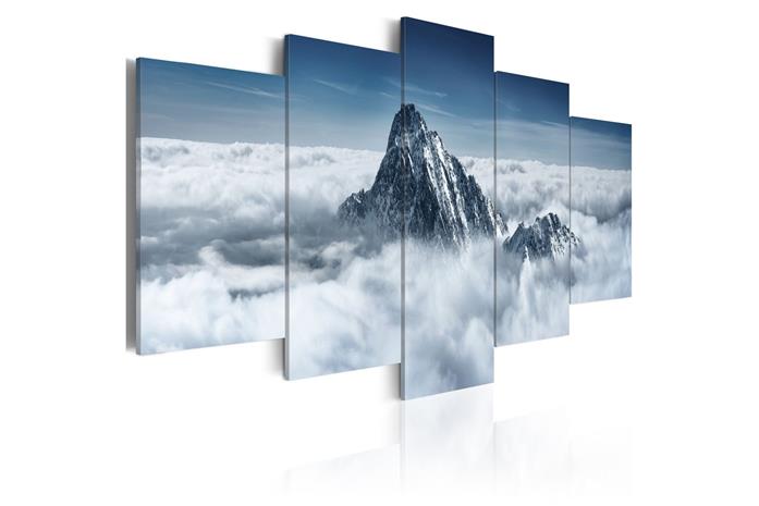 Kuva - A peak rising above the clouds